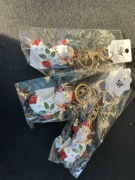 świąteczny brelok do kluczy lub torebki w kształcie Świętego Mikołaja