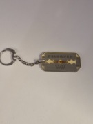 BRELOK Z PRL    ŻYLETKA POLSILVER STAINLESS