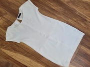 Śmietankowa sukienka  36