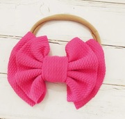 Urocza opaska bezuciskowa z kokardą (różowa)