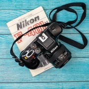 Aparat analogowy Nikon F401 + Nikon 35-70 mm f 3.3-4.5 + pasek , instrukcja
