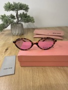 Okulary damskie Miu