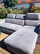 Narożnik z funkcją spania i pojemnikiem na pościel