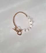 Bransoletka damska biale serduszka stal chirurgiczna