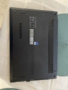 Asus Pro 2530UA z ładowarką.