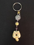 Brelok kot donut pączkot żółty blond słońce 