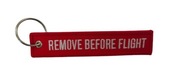 Haftowany brelok lotniczy REMOVE BEFORE FLIGHT – czerwony