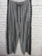 Nike spodnie dresowe czarno białe rozpinane napy streetwear M unisex