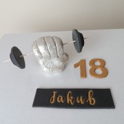 Pięść siłownia ciężarki na tort 