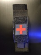 Ładownica MOLLE na stazę/tourniquet/opaskę uciskową z krzyżem CZARNA