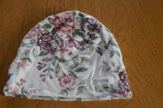 Newbie  44/46 r. 4-9 m kwiatowa czapka