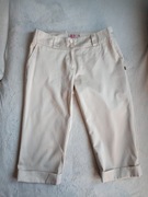 Jasne eleganckie spodnie 3/4 imitacja satyny 36