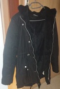 Warm black jacket with a rainproof exterior