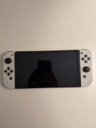 Nintendo Switch OLED + Ring Fit Adventure + Pro Controller