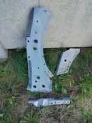 Clio IV fartuch lewy przód nadkole podłuznica