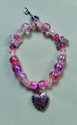 Różowa bransoletka serce, klucz, motyle