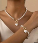 Nowy naszyjnik z  branzoletką z pereł. 