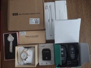 Adaptery ,2 zegarki ,piloty do aparatu, rysik do ekranow, naped przenosny