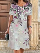 Letnia jasna sukienka w kolorowy  kwiatowy wzór 50