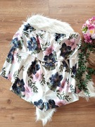 biały elegancki krótki kombinezon kwiecisty w kwiaty 40L na komunie