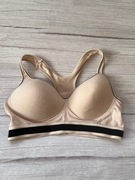 36 B beżowy cielisty biustonosz sportowy