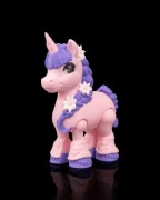 Ruchomy Jednorożec Flora Belle z Warkoczem i Kwiatami