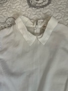 Biała bluzka bez rękawów DIVERSE XS z kołnierzykiem