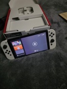 Nintendo Switch OLED – biały – stan bardzo dobry + komplet dodatków