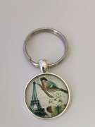 Brelok , breloczek , wypukłe szkło..