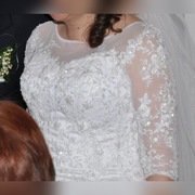 BIAŁA KORONKOWA SUKNIA ŚLUBNA Z RĘKAWKAMI