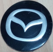 Mazda emblemat starego typu wkręcany