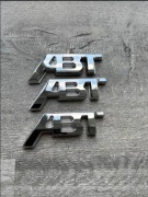 Emblemat samoprzylepny ABT srebrny.