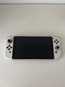 Nintendo Switch OLED + Nintendo Switch Pro Controller + Zelda BotW + Etui