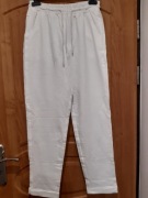 Białe spodnie Megi lxl min min beżowe naszywki