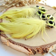 Żółte kolczyki sutasz z piórami