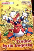 Komiks Gigant poleca Trudne życie bogacza tom 260 Disney 