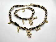 Zestaw, naszyjnik + bransoletka, panterka, złote zawieszki, stal chirurg.