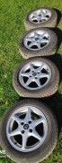 Felgi aluminiowe 14 cali wraz z oponami letnimi.