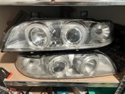 Lampy przednie reflektory bmw e39 ringi chrom led