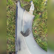 Błotnik lewy navara d40