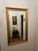 Lustro w drewnianej ramie