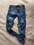 Damskie spodnie jeansowe marszczone nogawki suwak S dlugie Remixx 36 skinny