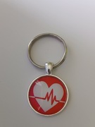 Brelok , breloczek , wypukłe szkło..