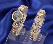 Exluzywny zegarek z branzoletka i czarnym oczkiem. 