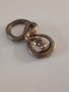 Figurka  metalowa wąż wysokość 1 cm długość 5cm
