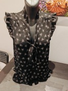 Elegancka Czarna Bluzka Bez Rękawów z Wzorem w Kokardki