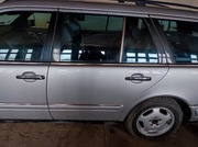 Drzwi lewy tył Mercedes w210 lewy tył lak 744