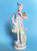 Figurka porcelanowa: „Muzyk z turkawką”