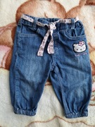 Niebieskie spodnie jeansowe H&M 74 Hello Kitty babeczki jeansy