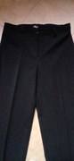Damskie klasyczne spodnie garniturowe na kant 42